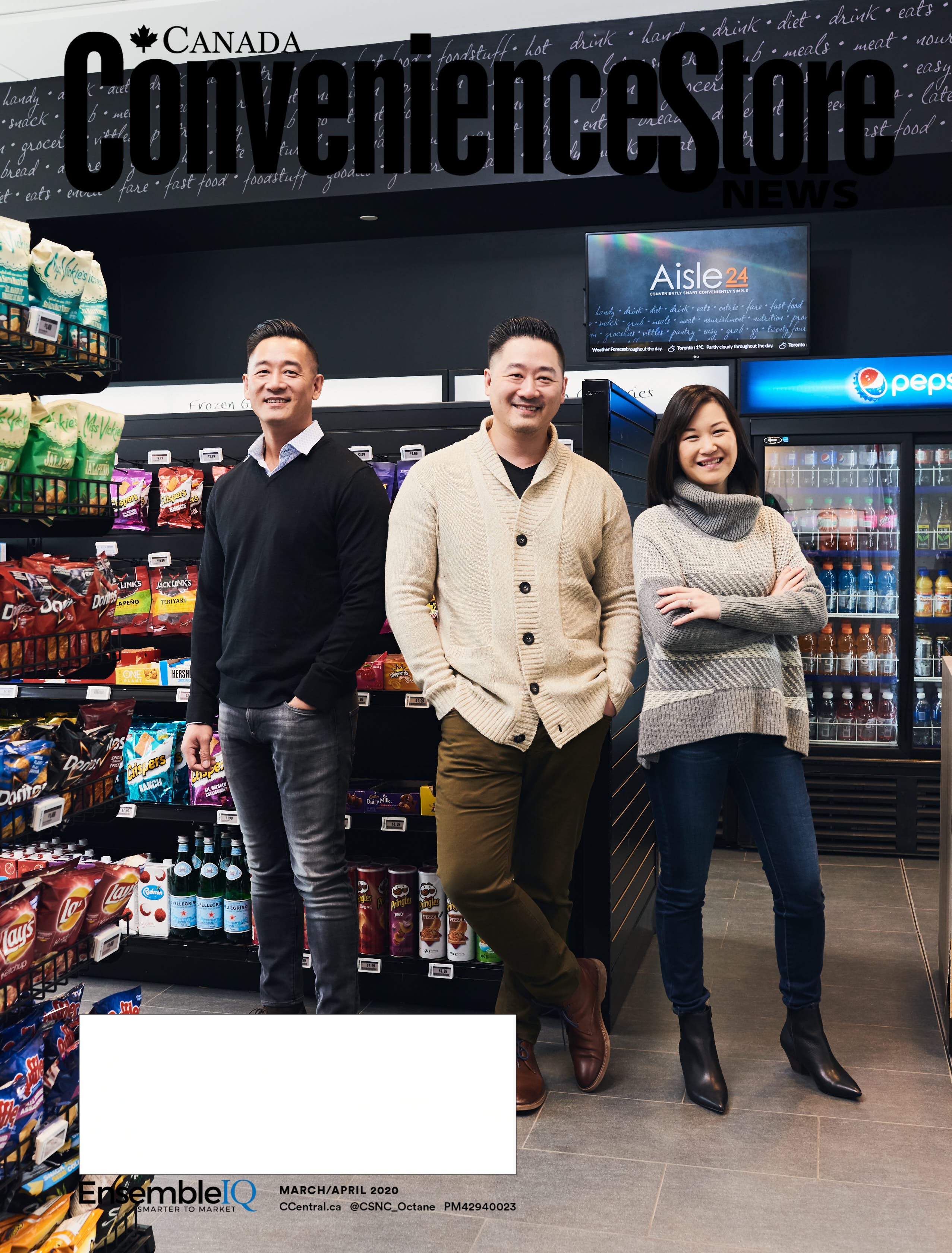 Three young smiling business people standing in convenience store