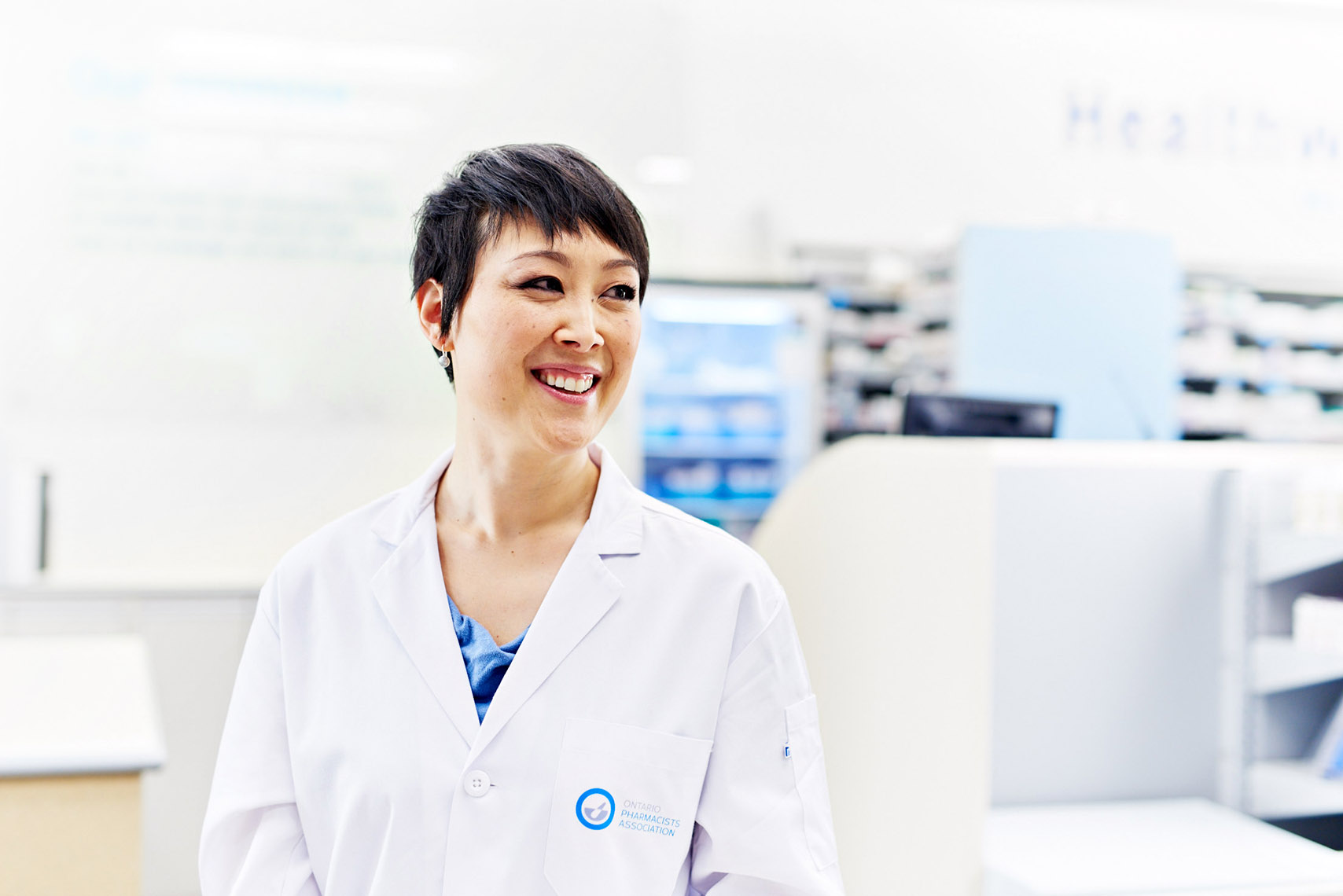 Portrait of smiling pharmacist in Shoppers Drug Mart for Ontario Pharmacists Association