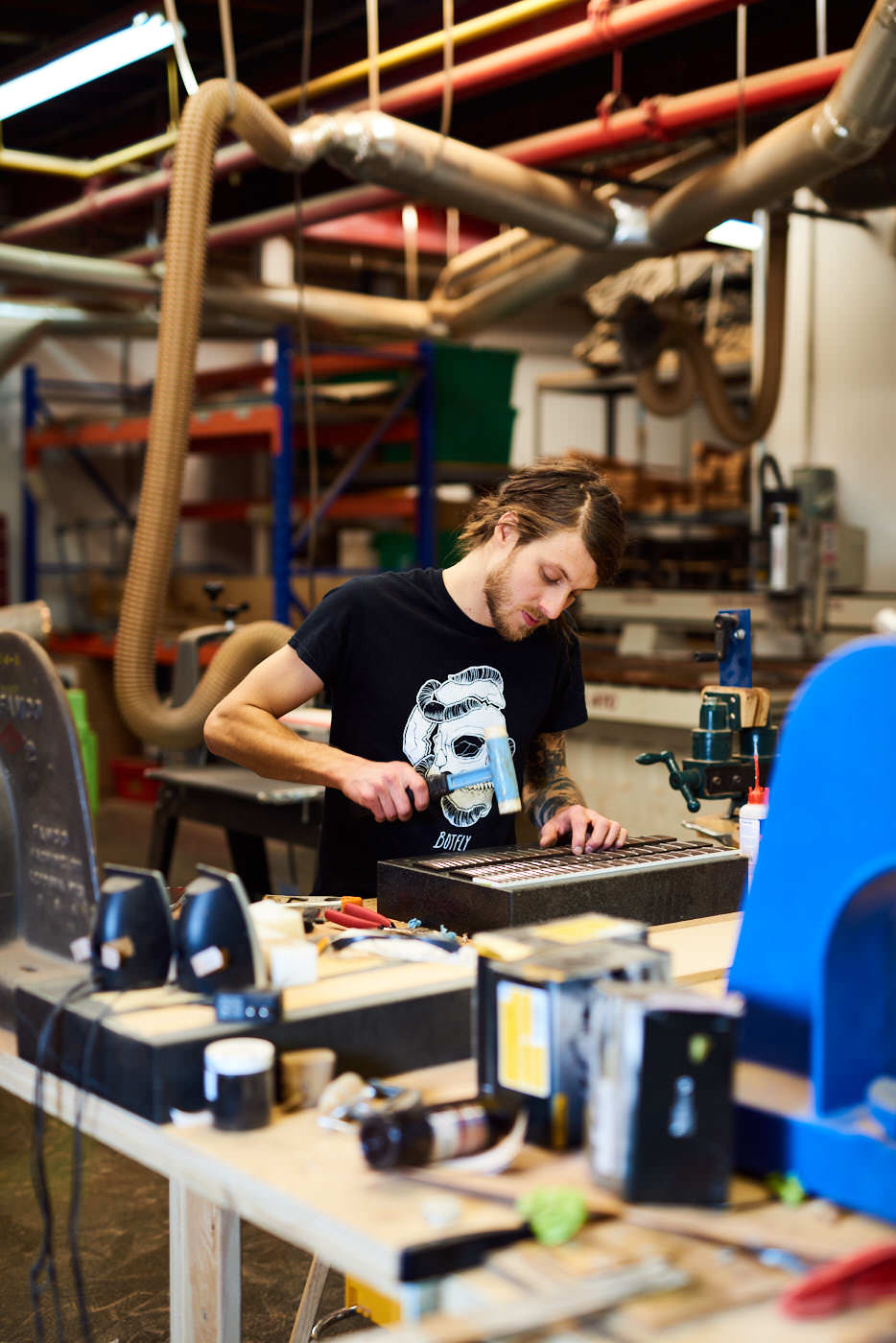Guitar maker working in studio