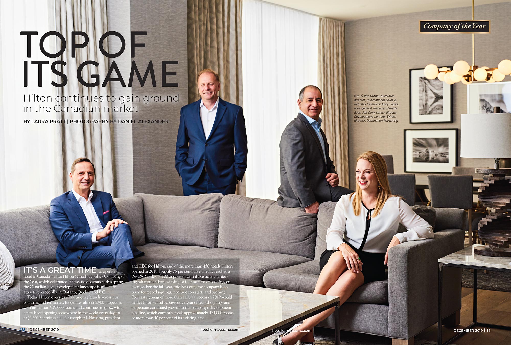 Four business corporate executives seated in modern upscale hotel room