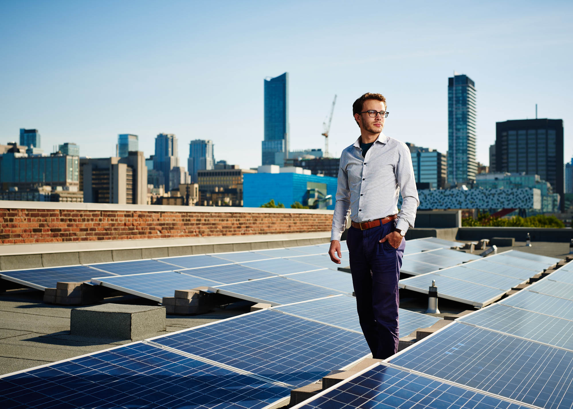 corporate-ceo-next-to-solar-panels