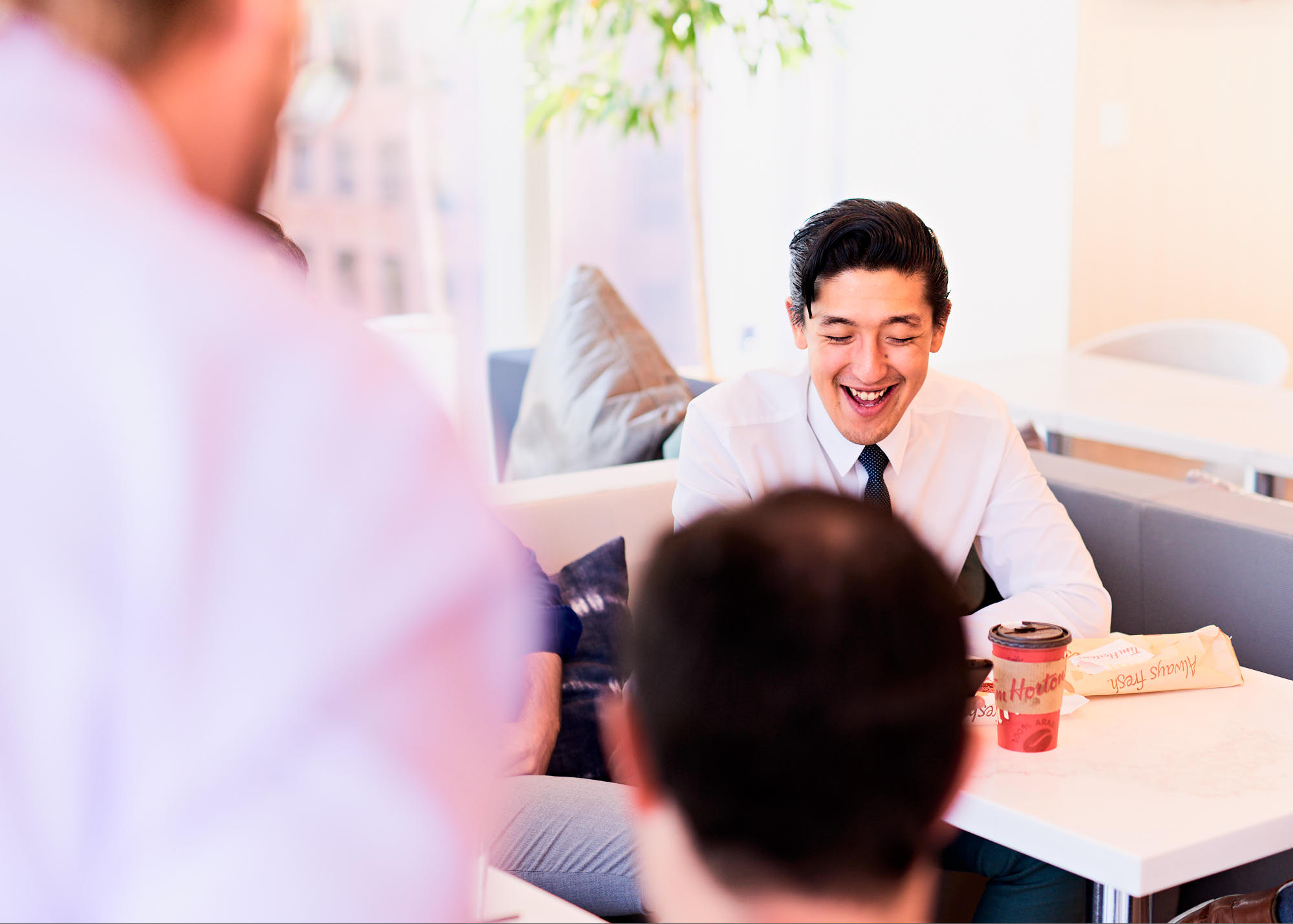 corporate-team-laughing-in-office