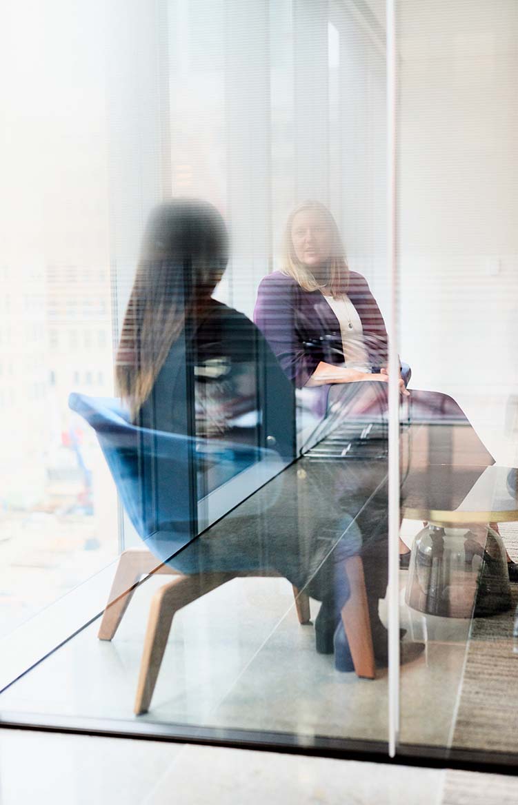 female-business-executives-through-glass-1