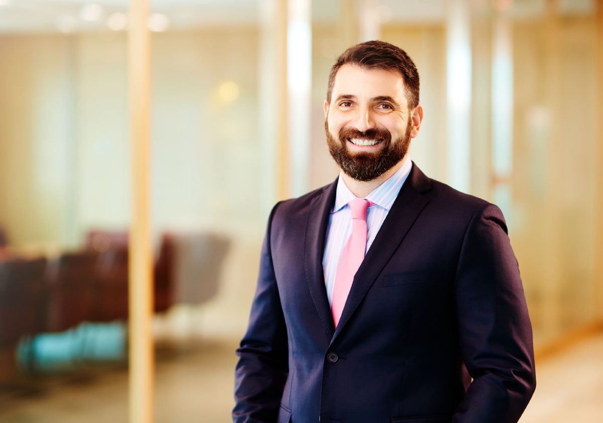 On site office photography corporate headshot of smiling Toronto businessman