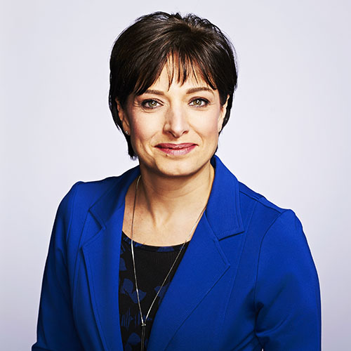 Female Toronto corporate banker business headshot on grey background