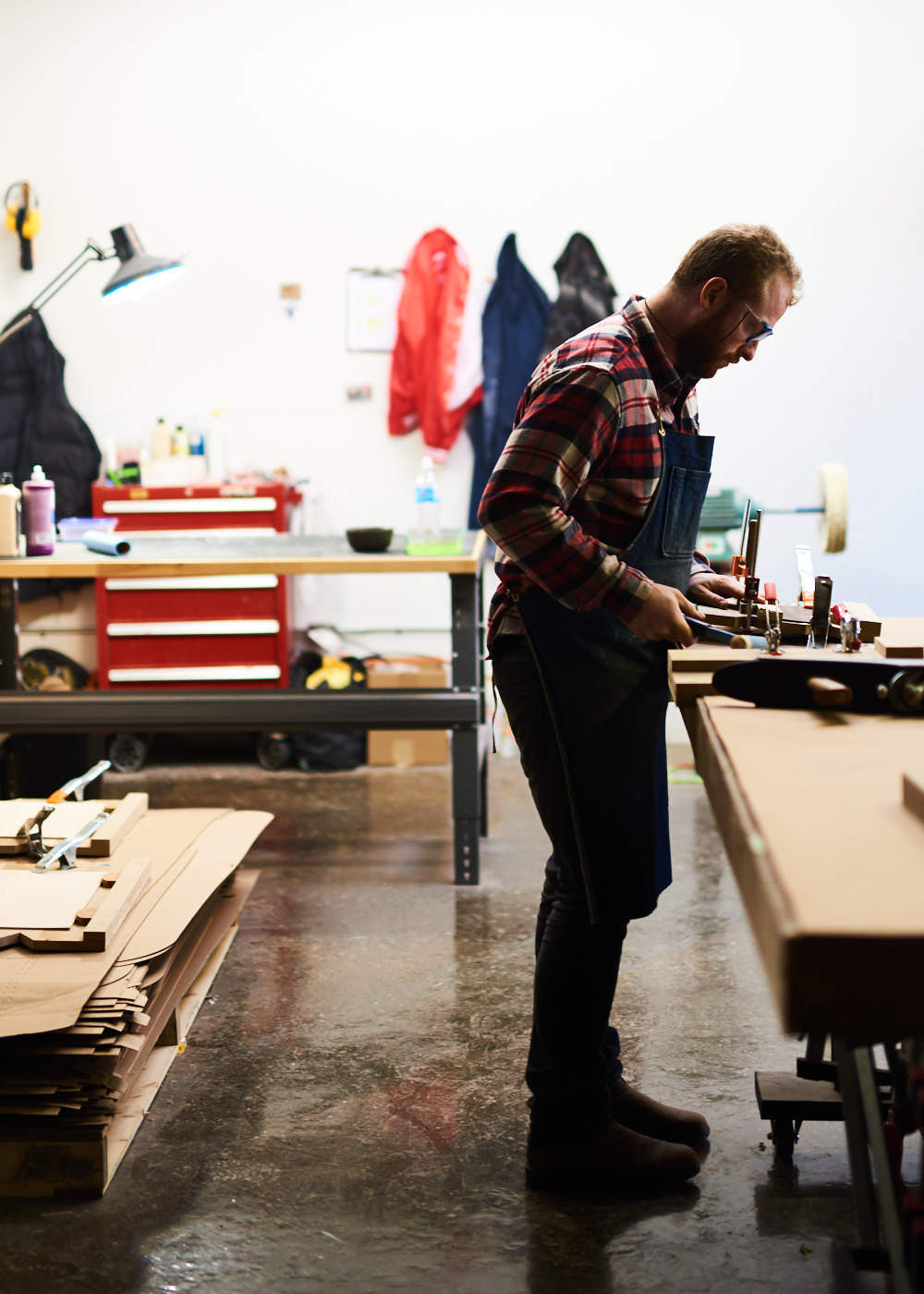 profile-of-toronto-guitar-maker-adjusting-instrument