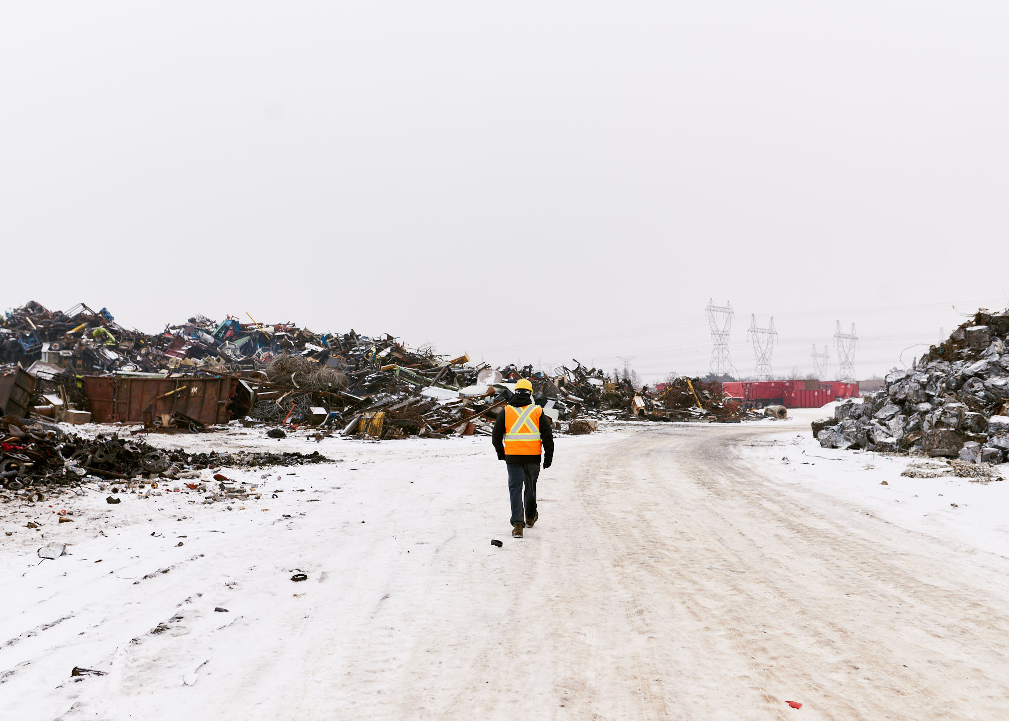 steel-worker-walking-through-yard